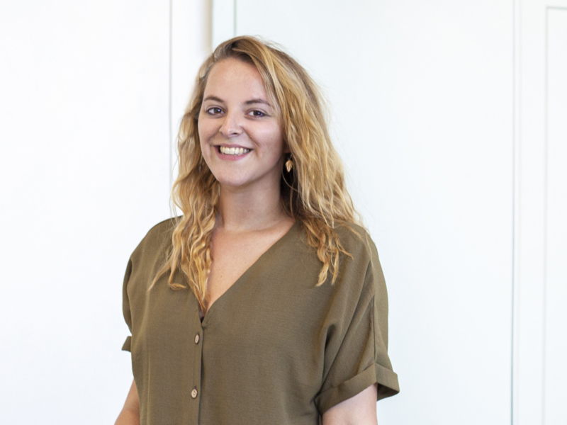 Headshot of Dani Bower. white female with long blond curly hair smiling at the camera Headshot of Dani Bower. white female with long blond curly hair smiling at the camera
